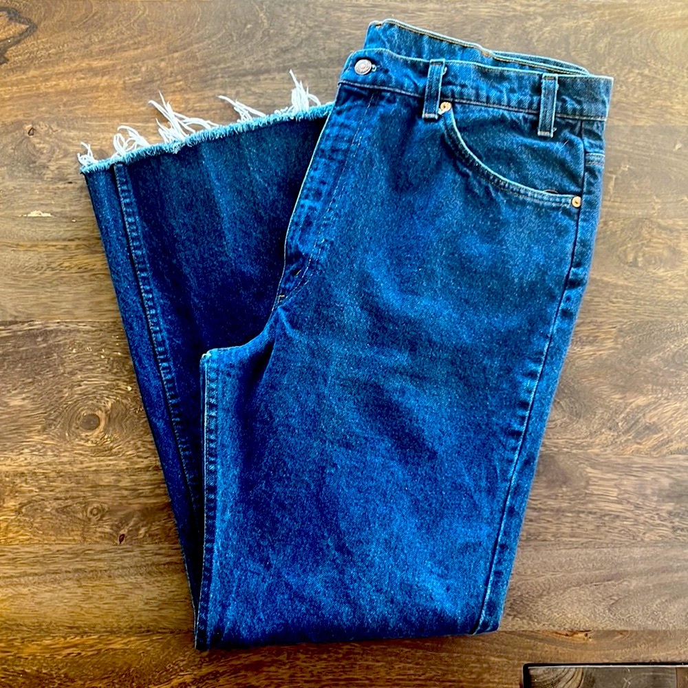 Orange tab Levi’s vintage high rise dark wash raw hem
